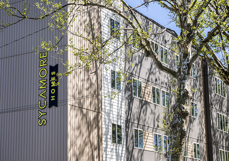 Exterior view of the Sycamore Homes affordable housing building in Harrisburg